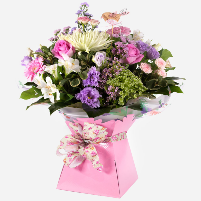 Sugar Rush - This gorgeous hand-tied bouquet of sweet pastel shades is sure to bring joy and delight. Crammed with beautiful flowers guaranteed to put a boost into any occasion.
