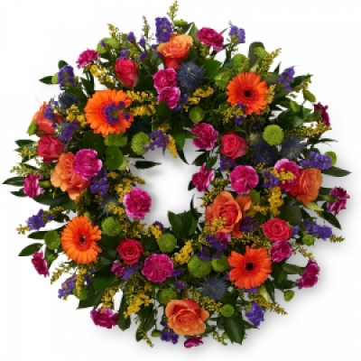 Loose Ring Wreath (Dark) - Mixed flowers suitable for a lady or a gentleman. Ring wreath for a funeral. Stunning array of colours in oranges, purples and pinks/reds.