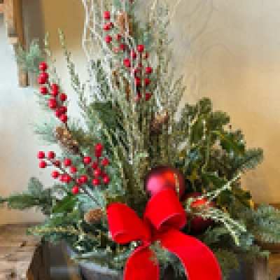 Christmas door stopper - Festive greenery ,Twigs and decorations to create a stunning entrance .This is a long lasting arrangement for out door or inside Finished with festive picks.