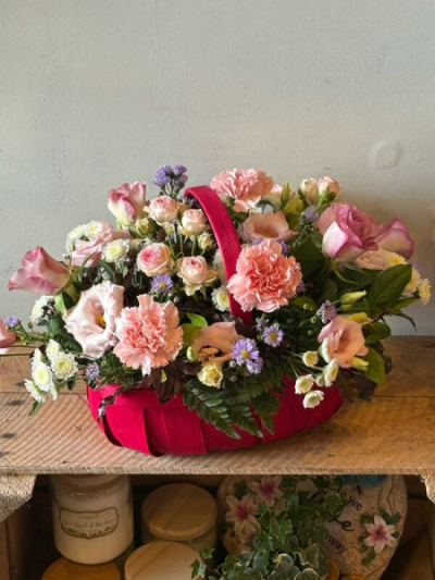 Pretty in Pink Basket - A charming floral basket featuring soft pink and pastel tones, beautifully arranged for a thoughtful gift.